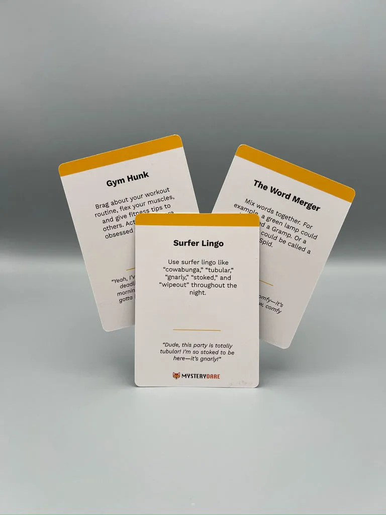 Three dare cards standing upright: 'Gym Hunk', 'The Word Wager' and 'Surfer Lingo'